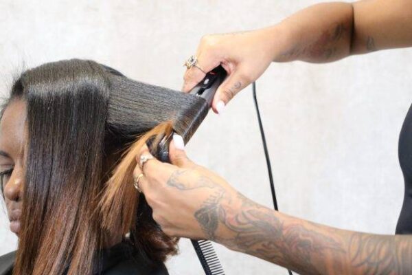 Hair Styling Curling with a flat iron